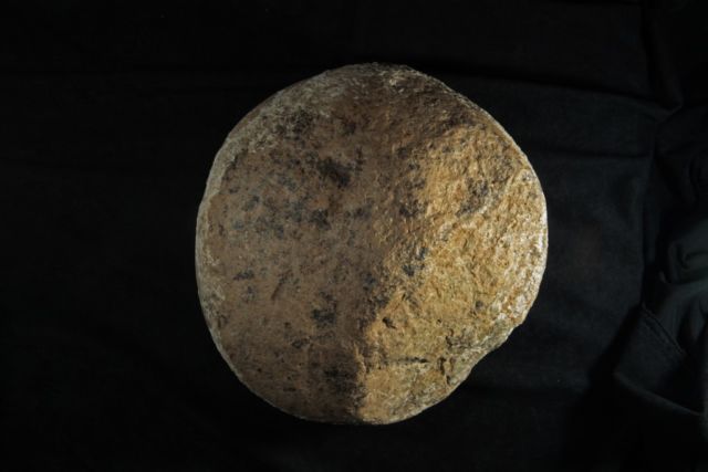 A stone cobble that early humans may or may not have used as a hammer 130,000 years ago.