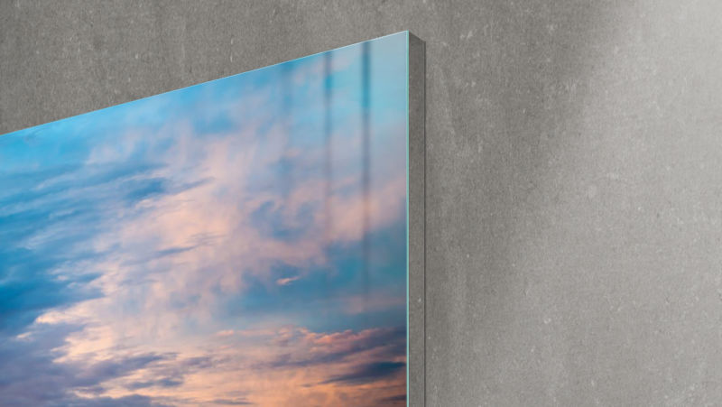 Flatscreen TV with image of sunset.