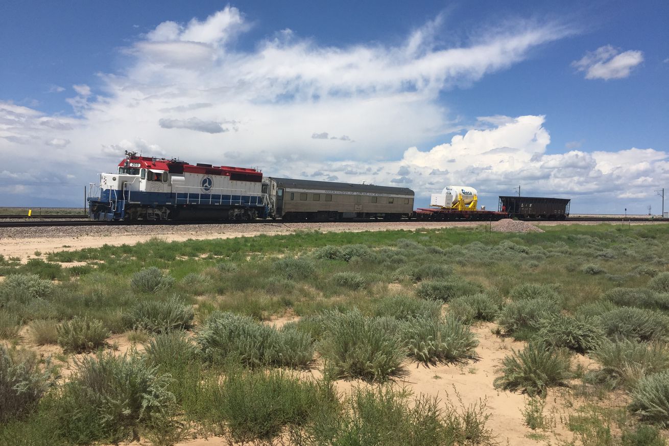 <em>The transportation cask on a train.</em>