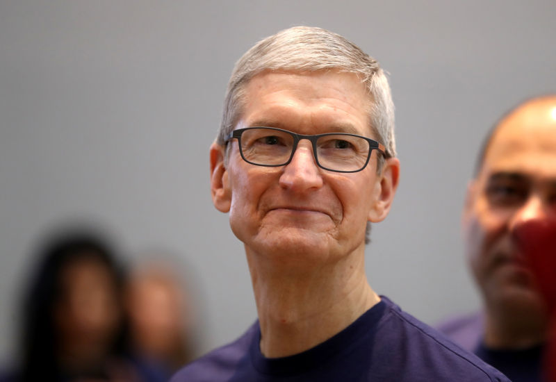Apple CEO Tim Cook looks on as the new iPhone X goes on sale at an Apple Store on November 3, 2017 in Palo Alto, California.