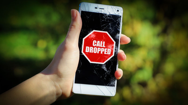 A person holding a cell phone that says,