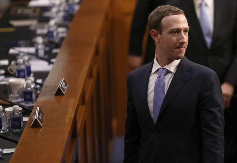 Facebook co-founder, Chairman and CEO Mark Zuckerberg departs after testifying before a combined Senate Judiciary and Commerce Committee hearing in the Hart Senate Office Building on Capitol Hill, April 10, 2018, in Washington, DC. 