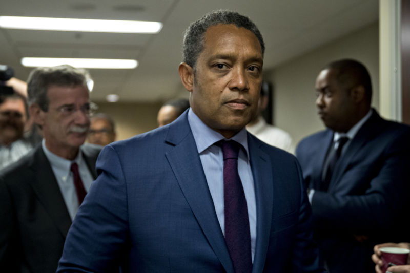 Karl Racine, District of Columbia attorney general, center, and Brian Frosh, Maryland attorney general, left, arrive at a news conference in Washington, D.C., US, on Monday, June 12, 2017.