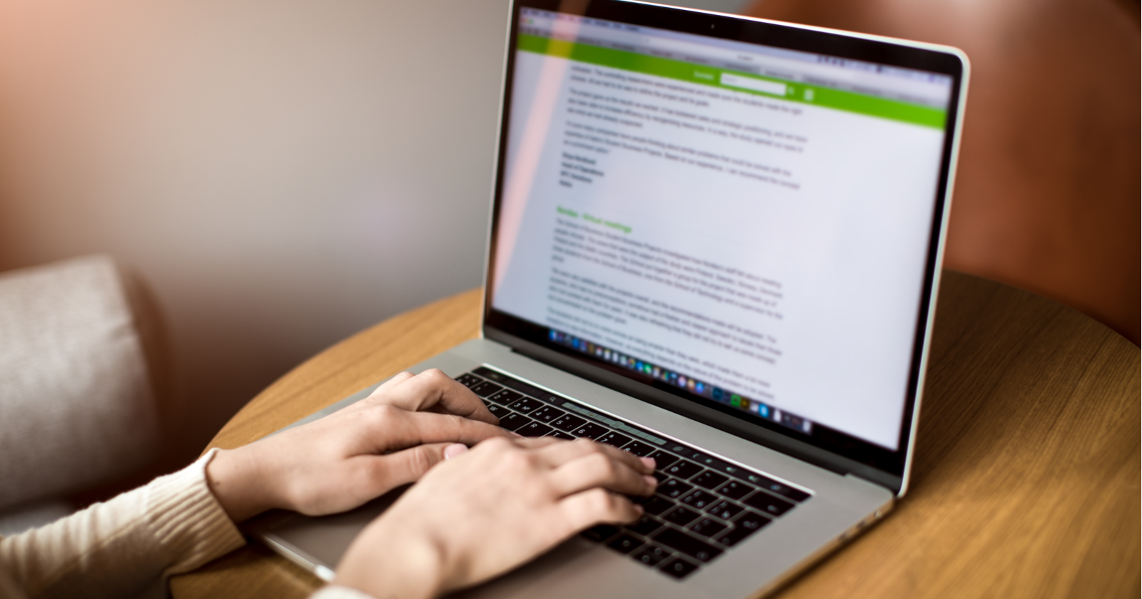 Woman typing on laptop