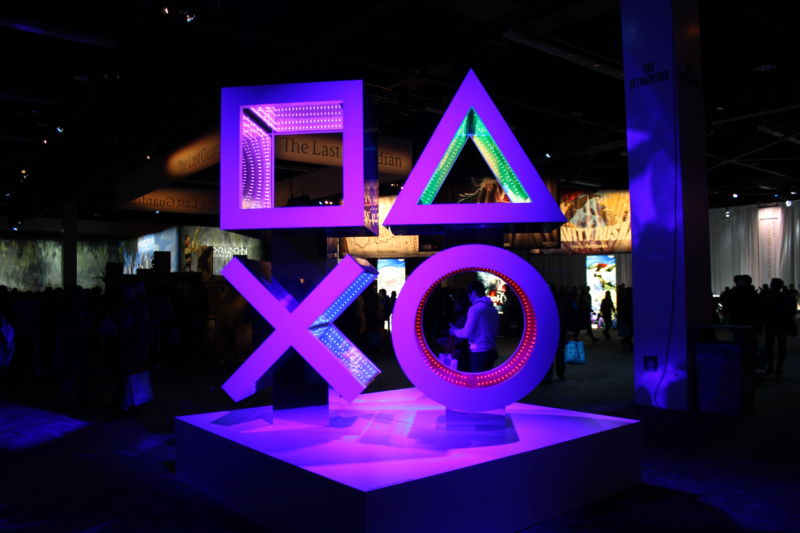 Giant PlayStation button icons.