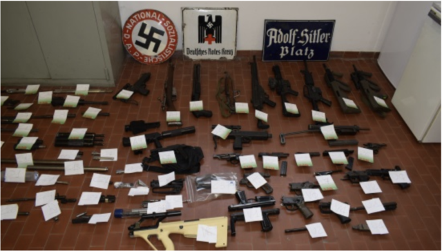 Military weapons seized in a raid by Italian police on a neo-fascist organization member's hone in Pavia province, Italy on July 15, 2019.