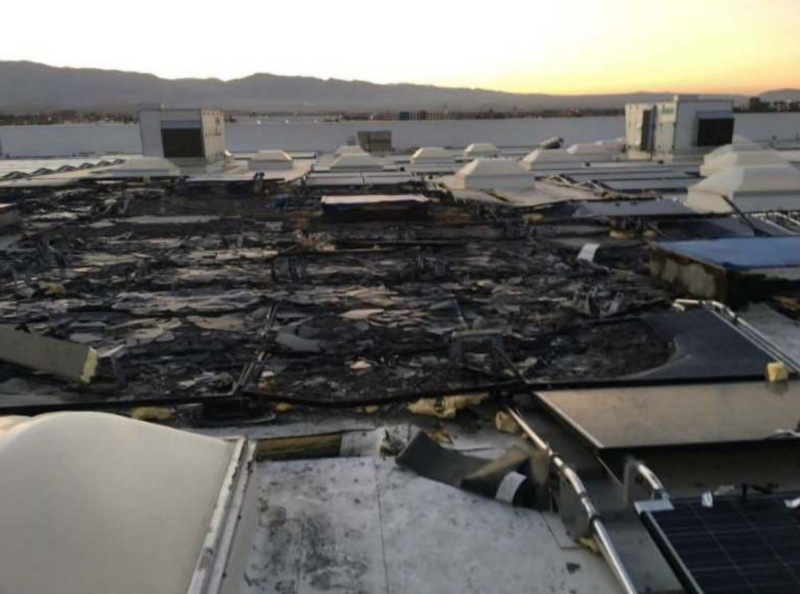 Fire damage on the roof of a Walmart store in Indio, California.