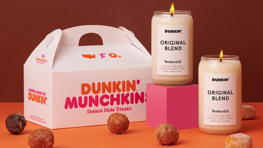 Studio product shot of Dunkin's original blend candles with munchkins