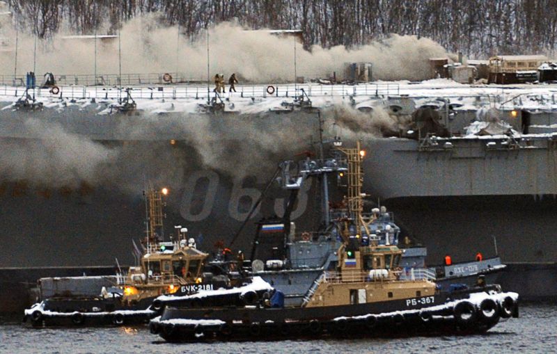 MURMANSK, RUSSIA - DECEMBER 12, 2019: A fire has broken out aboard the Project 11435 aircraft carrier Admiral Kuznetsov of the Russian Northern Fleet. Admiral Kuznetsov is the only aircraft carrier of the Russian Navy. Lev Fedoseyev/TASS 