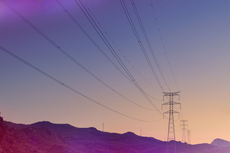 Electricity pylons at sunset