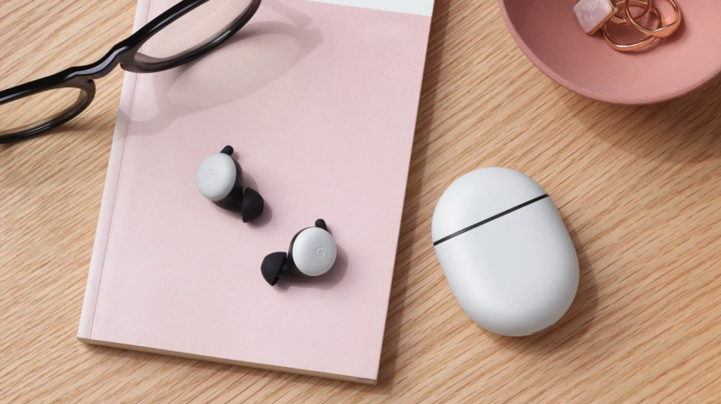 Promotional of Google Pixel Buds on desk.