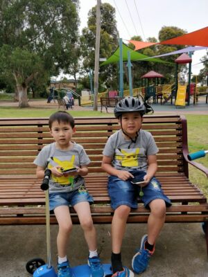 Two young <em>Pokémon Go</em> players that are likely not playing in the park these days.