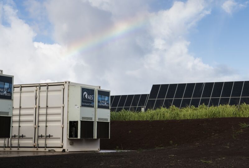 Image of a large container near solar panels.