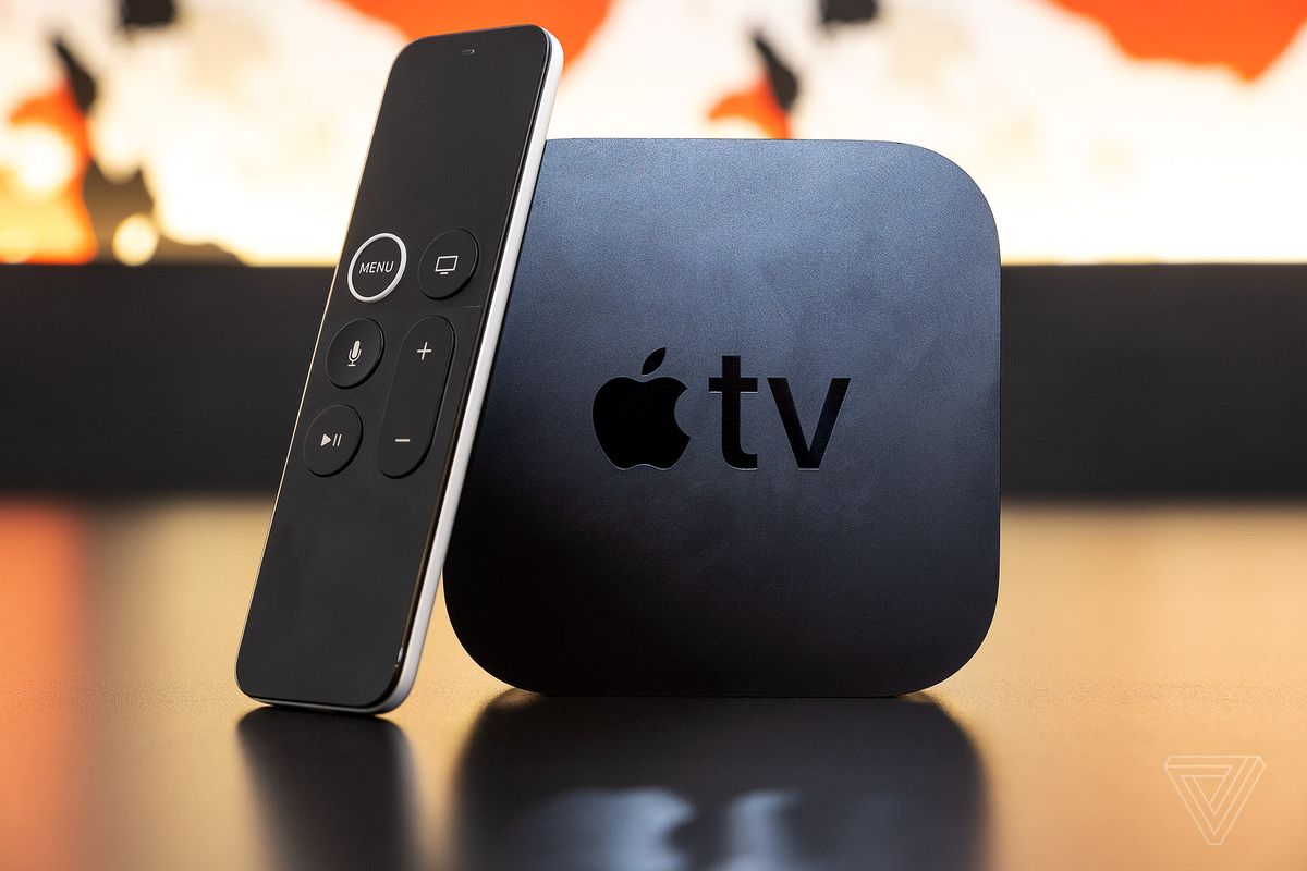 The Apple TV 4K, the best streaming player user experience, on a table with the Siri remote.
