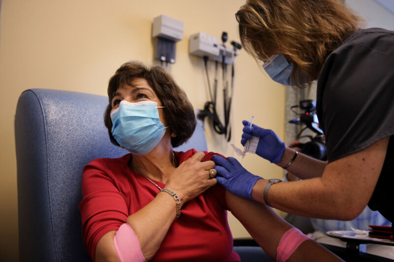 Woman receives an experimental COVID-19 vaccine at the University of Massachusetts Medical School in Worcester, MA, on September 04, 2020, as part of a clinical trial.