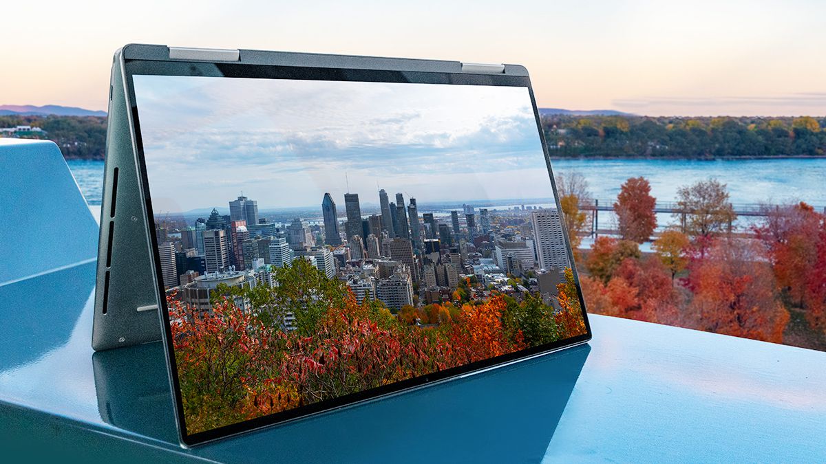 The Dell XPS 13 2-in-1 on a bench in Montreal.