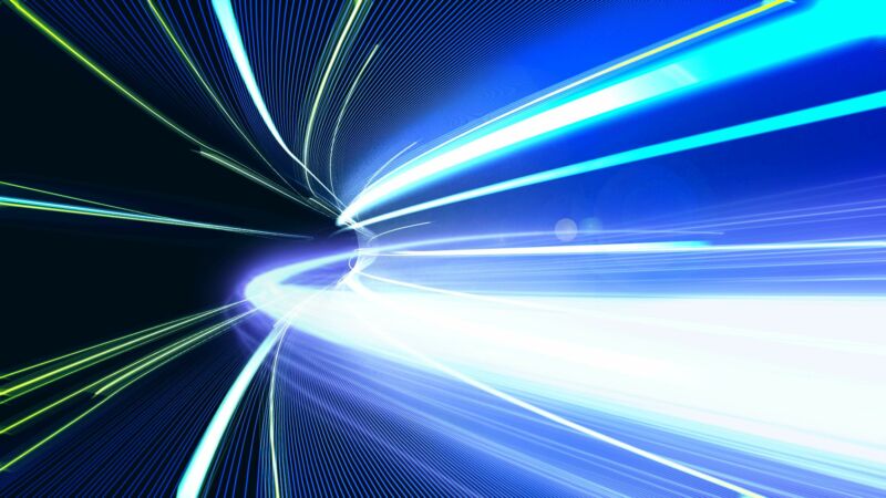 Illustration of lasers flowing down a tunnel to represent fast broadband speeds.