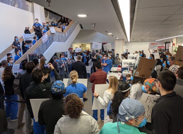 Protests at Stanford Medical Center. <em>Credit: Ars Technica</em>