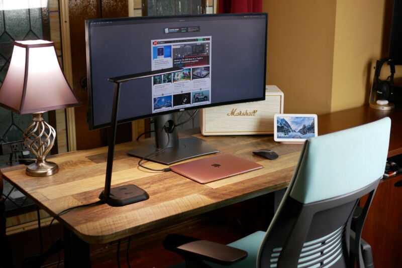 Vari Standing Desk with a monitor and laptop setup