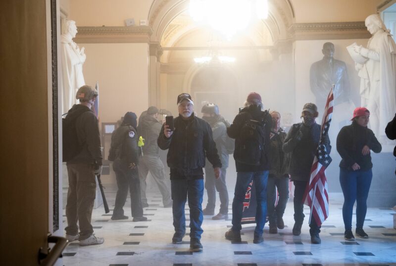 Supporters of US President Donald Trump breach the US Capitol on January 6, 2021, in Washington, DC.