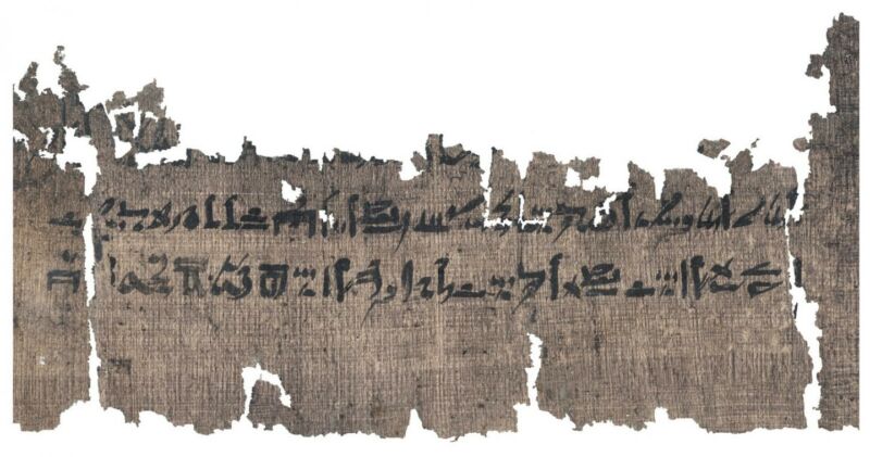 Battered ancient text against a white background.