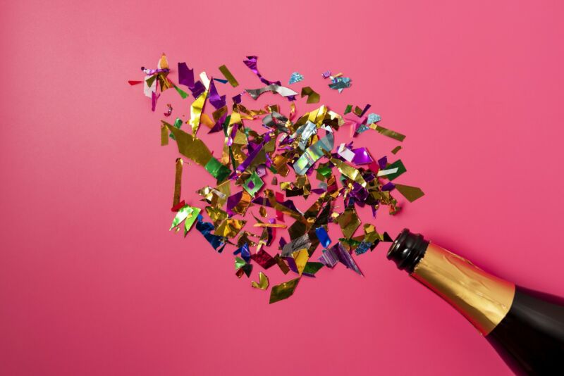 Champagne bottle and confetti