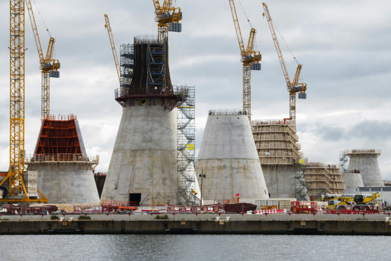 Image of massive concrete cones and cranes.