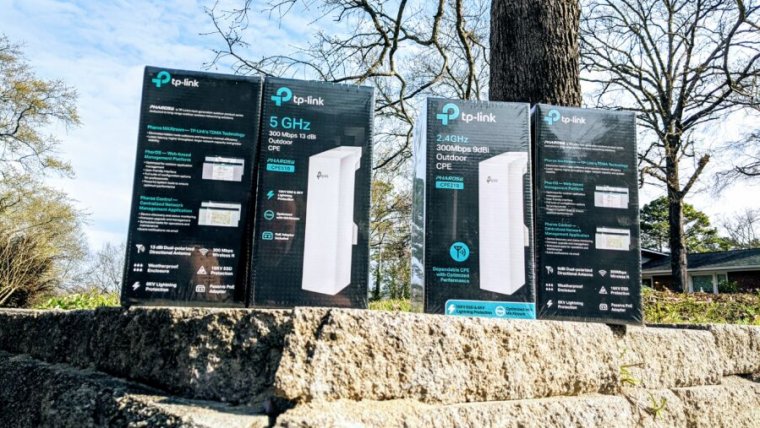 We tested these TP-Link outdoor Wi-Fi bridges—both 2.4GHz and 5GHz versions—across 80 meters of partially-wooded terrain, with great success.