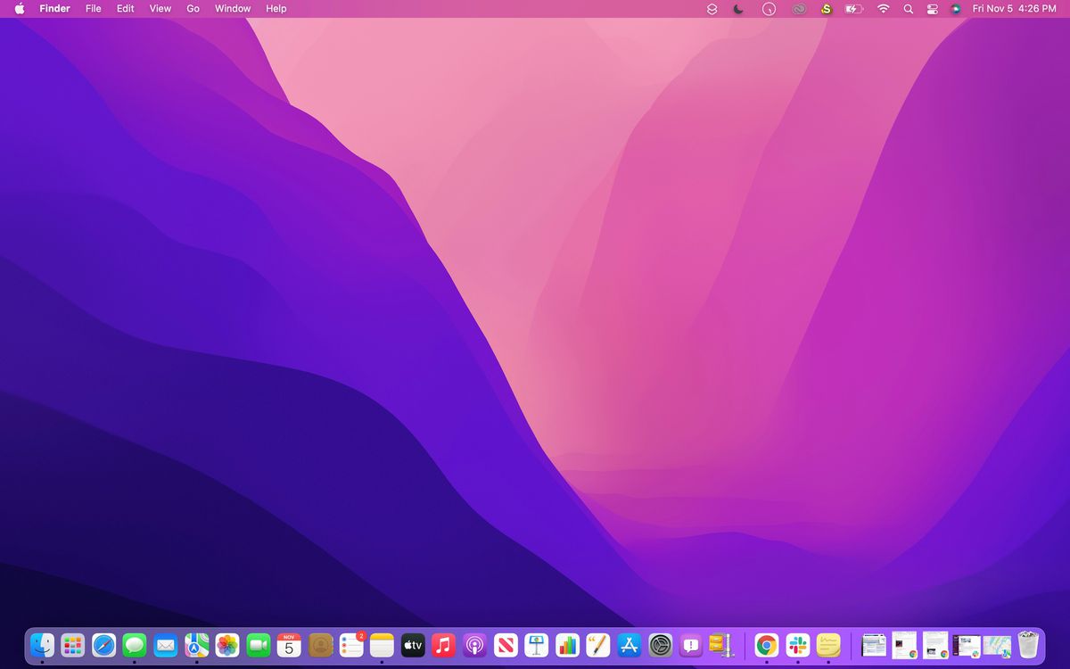 A blank MacBook desktop with a purple and pink gradient background.