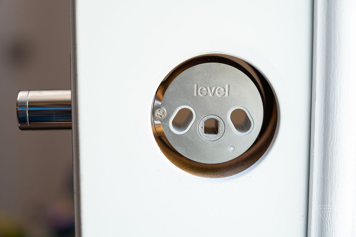 The Level Lock smart lock in a door frame