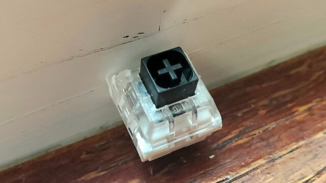 A Kailh Box Black mechanical keyboard switch.