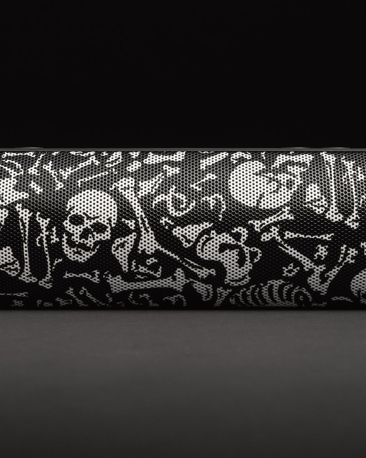 black speaker with white skull and crossbones