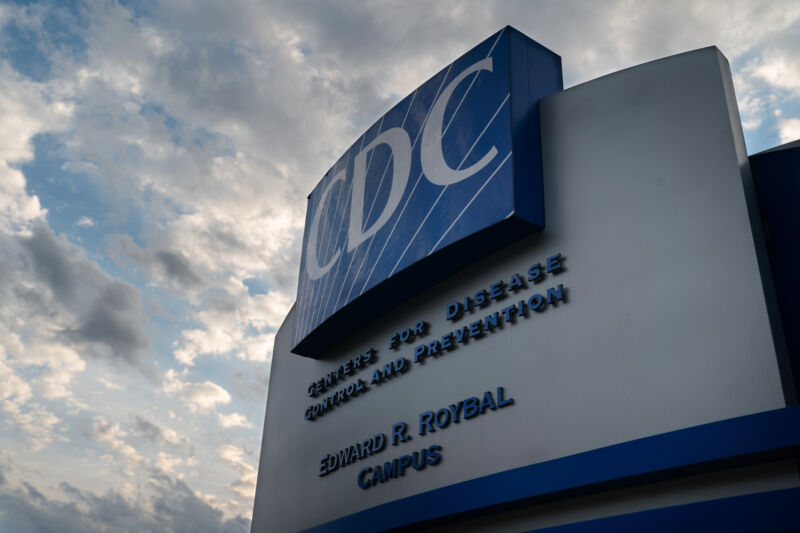 Huge facade for CDC headquarters against a beautiful sky.