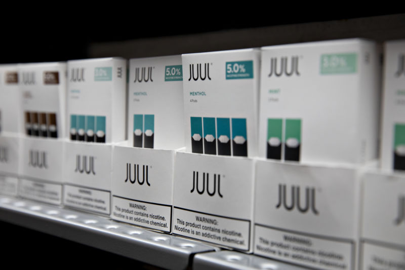 Mint and menthol pods for Juul Labs Inc. e-cigarettes are displayed for sale at a store in Princeton, Illinois, in September 2019. 