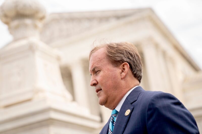 Texas Attorney General Ken Paxton standing in front of the US Supreme Court building.