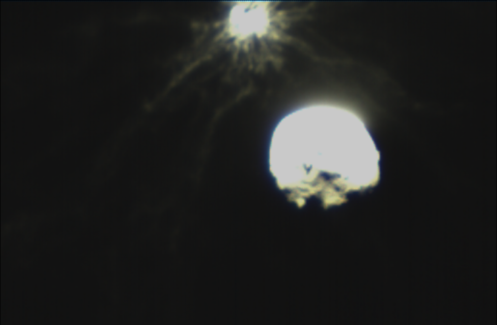 A close-up and somewhat overexposed view of the impact, showing lots of material in the vicinity of Dimorphos.