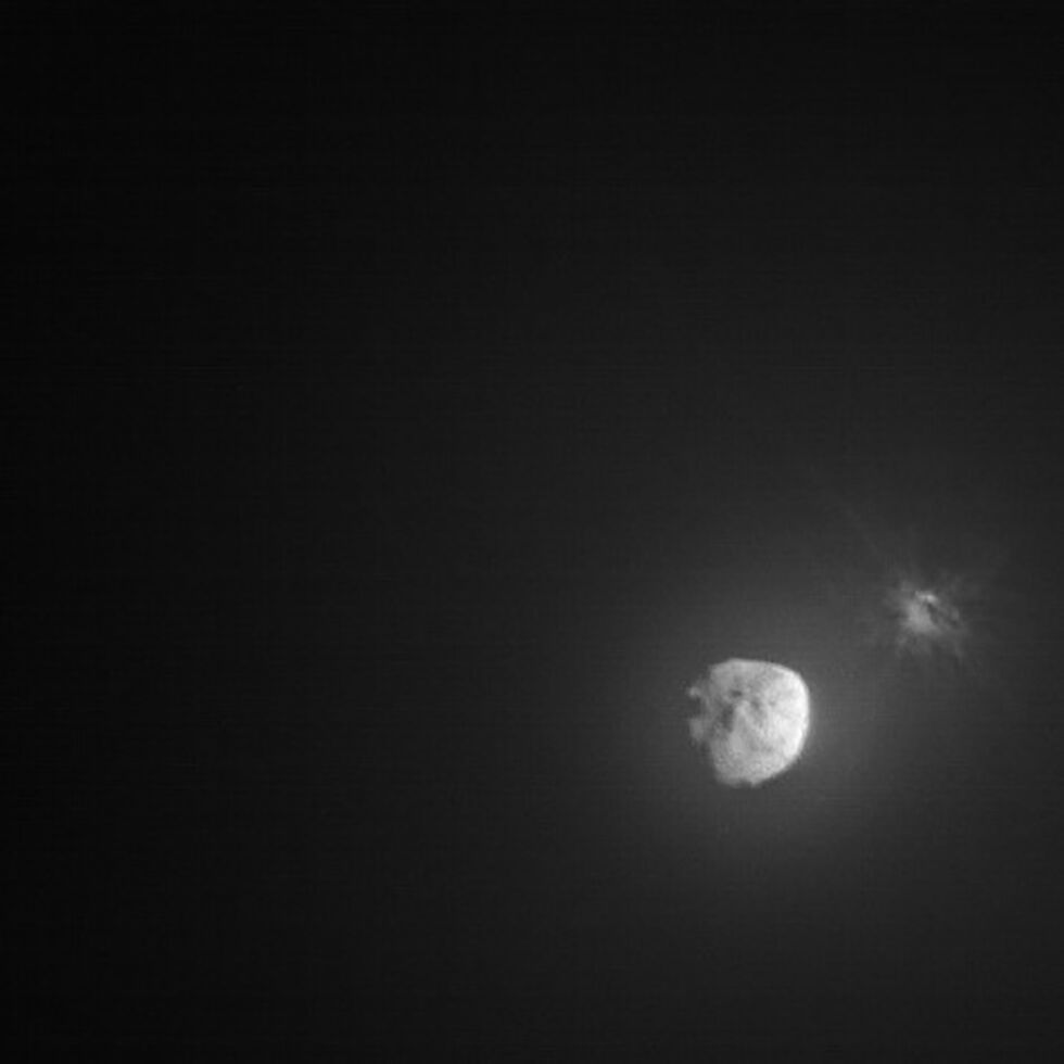 A more distant view of the collision aftermath, showing that Dimorphos looks a bit indistinct due to all the material ejected in the aftermath of the collision.