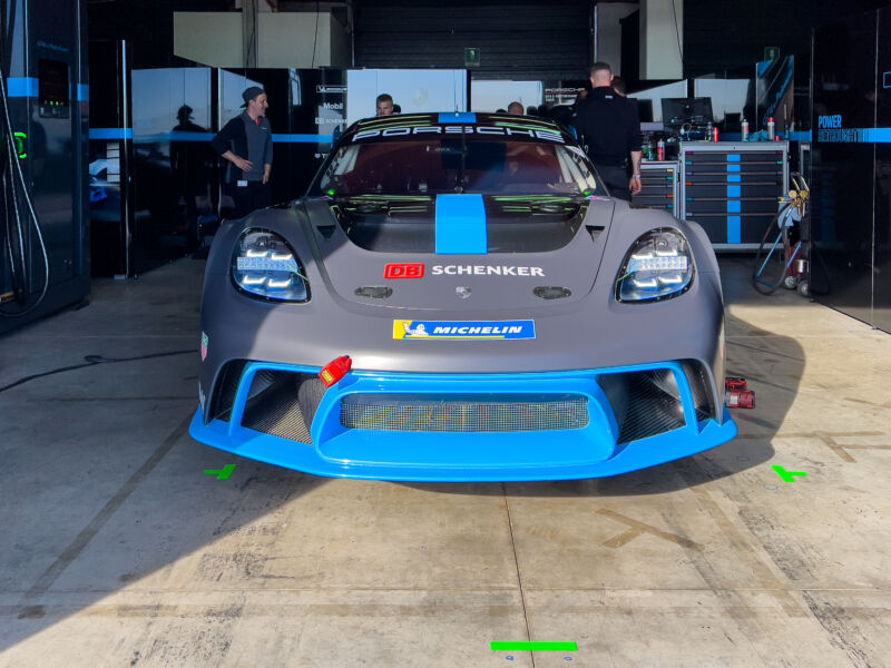 The exterior clues that this is a Porsche 718 GT4 ePerformance and not a 718 GT4 Clubsport are subtle; it's 140 mm (5.5 inches) wider, and the headlight projectors look more like a Taycan's than a Cayman's. But it's an all-electric car with more than a thousand horsepower on tap.