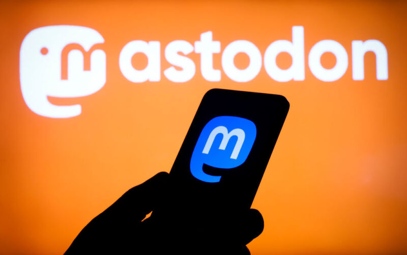 The Twitter and Mastodon app logos are seen in this photo illustration in Warsaw, Poland on 12 November, 2022. Mastodon is a decentralized, open-source network that comes without an algorithm or ads and doesnt sell the data of its users. Hundreds of thousands of users have joined Mastodon since Musk took over Twitter. Since Musk's takeover mass layoffs have taken place as well as a series of changes to the content moderation protocol and verification process. Furthermore reports have surface that Musk is considering putting all of Twitter behind a paywall. (Photo by STR/NurPhoto via Getty Images)