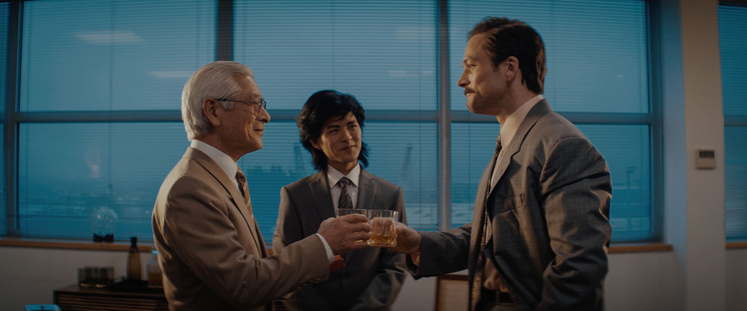 Togo Igawa, Nino Furuhata, and Taron Egerton in Tetris, premiering March 31st, 2023, on Apple TV Plus.