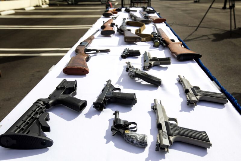 Guns on display during a buyback event in the Wilmington neighborhood of Los Angeles on March 4. Los Angeles County, in partnership with the Los Angeles Police Department, hosted a voluntary gun buyback event offering residents gift cards between $100-200 value to surrender their unwanted firearms. 