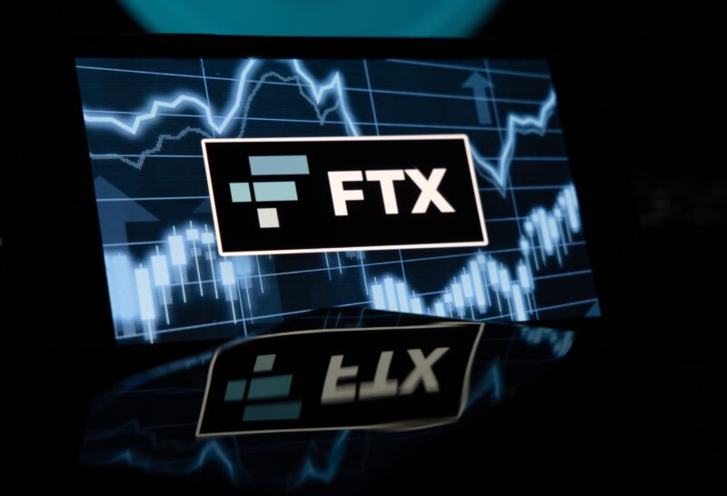 The FTX Cryptocurrency Derivatives Exchange logo on a laptop screen .