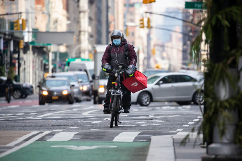 Bike rider delivery DoorDash in Manhattan