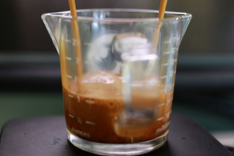 fermented coffee brewing in a glass container