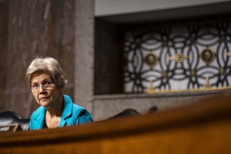 Sen Elizabeth Warren sits during a Senate committee hearing.