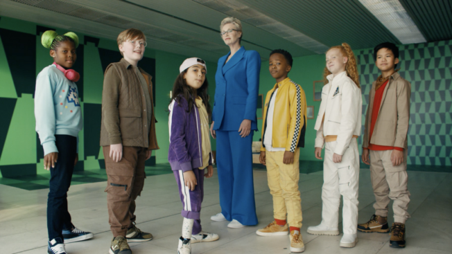 LEGO SUPERHERO KIDS STAND ALONGSIDE ACTOR JANE LYNCH