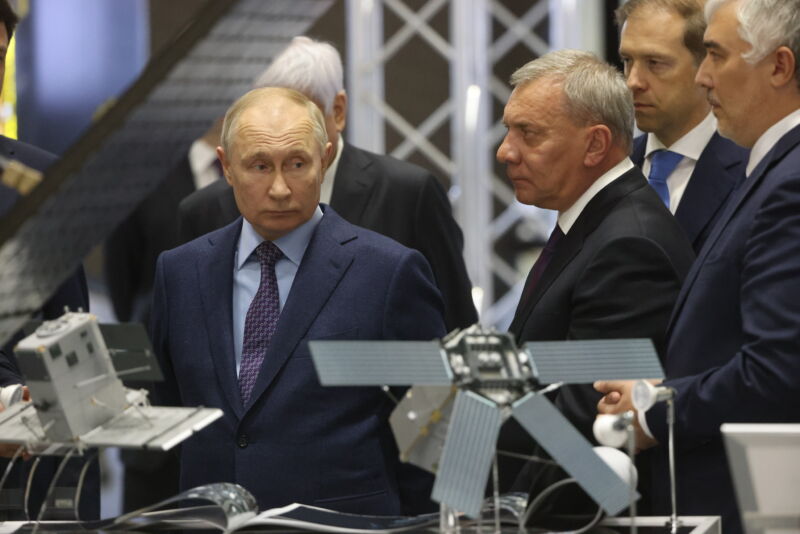 Russian President Vladimir Putin (L) and Roscosmos Space Corporation Chief Yuri Borisov peruse an exhibit while visiting the Korolev Rocket and Space Corporation Energia last October.