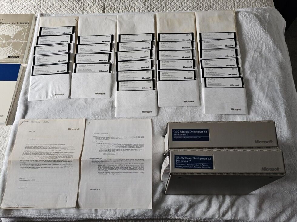 All 26 disks of the OS/2 2.0 preview, plus hefty documentation manuals. There are some things about the '90s I don't miss. 
