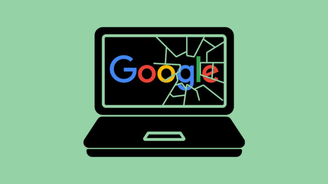 a black laptop with a broken screen displaying the google logo