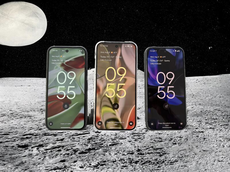 Three Pixel 9 phones, but with the background set to an AI-generated moonscape, with another moon visible in the background.